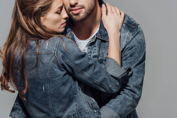 cropped shot of seductive young couple hugging isolated on grey  - Фото, изображение