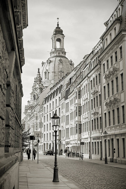  DRESDEN, GERMANY  OCTOBER 11, 2017: Street in the old town of Dresden with the rebuilt Frauenkirche in the background                               - Photo, Image