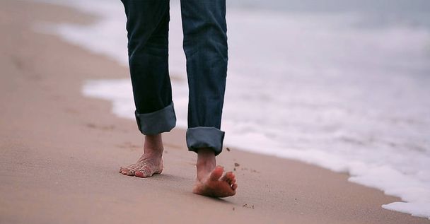 feet on a sand - Photo, image