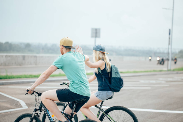 Couple of romantic lovers cycling people, love, nature and lifestyle concept - Foto, immagini