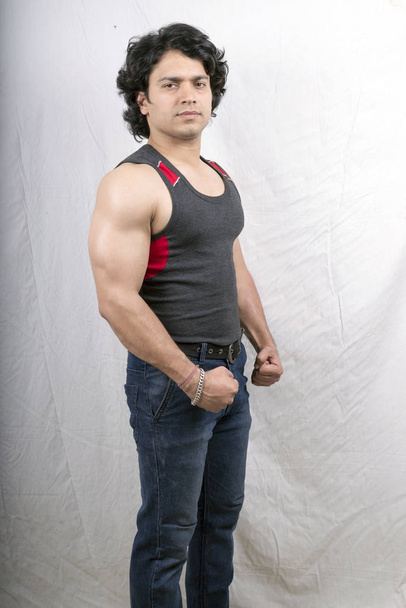 indian male model wearing grey vest - Fotó, kép