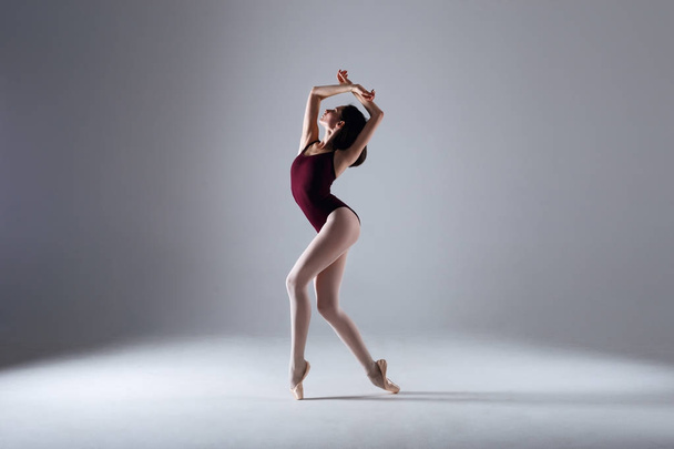 Ballerina dancing in the darkness - Photo, image
