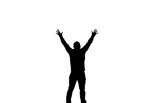 Un uomo felice. Silhouette di un uomo che alza le mani, isolato su sfondo bianco. Concetto di successo nelle imprese
. - Foto, immagini