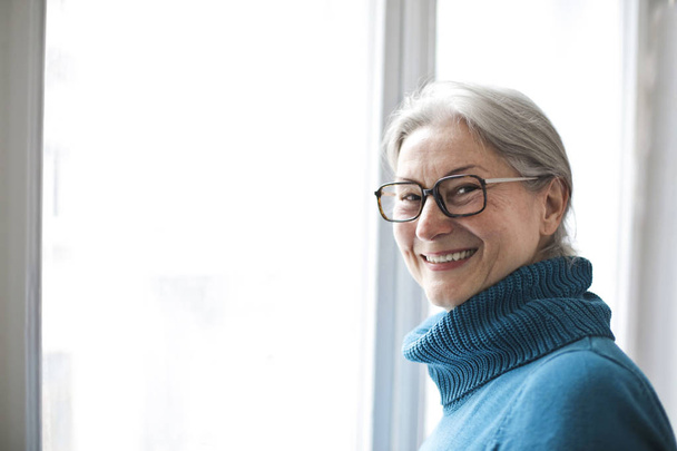 Portrait of an aged smiling woman  - Fotografie, Obrázek
