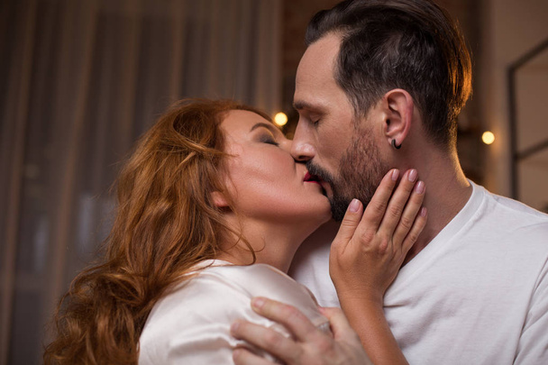 Sensual woman enjoying kiss of her lover - Fotó, kép