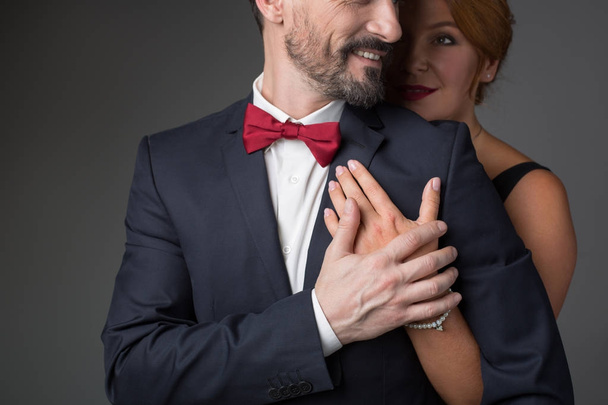 Joyful loving couple embracing with gentleness - Valokuva, kuva