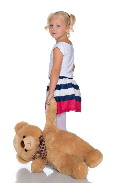 Little girl with teddy bear - Fotó, kép
