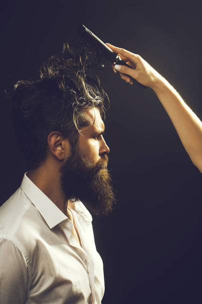 female hand combing bearded man - Foto, Imagen