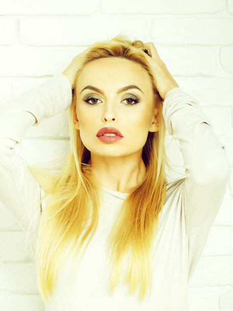 Pretty blonde girl with red lips - Valokuva, kuva