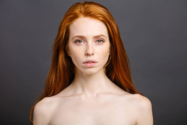 redhead woman,eyelashes, perfect skin. girl,shiny wavy hair - Foto, Imagen