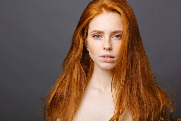 long red health hair of young attractive woman - Foto, Imagem
