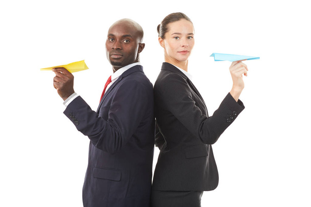 Portrait of startup business owners holding paper airplanes - Photo, Image