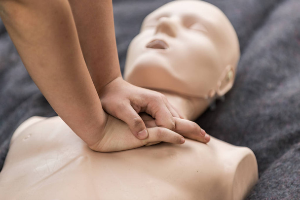 Cpr training outdoors. Reanimation procedure on CPR doll - Фото, зображення