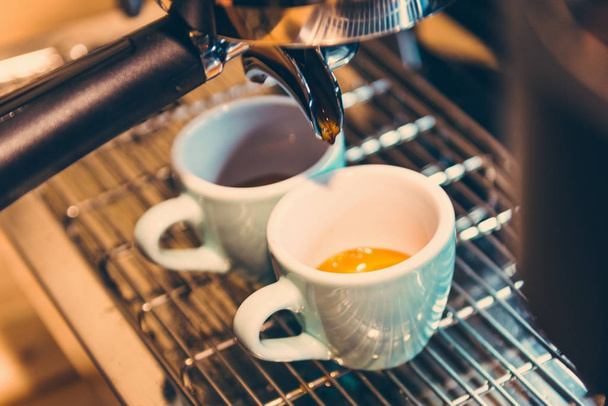 Italian espresso coffee machine and two coffee cups - Photo, Image