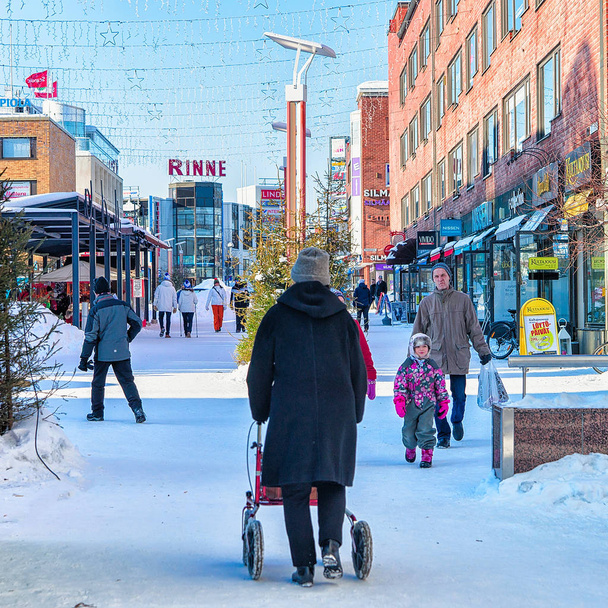 Senior woman with her walker at winter Rovaniemi - Fotoğraf, Görsel