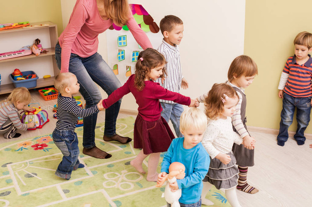 Group of little children dancing - Zdjęcie, obraz