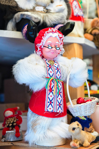 Market stall with Santa Claus wife in winter Rovaniemi - Photo, Image