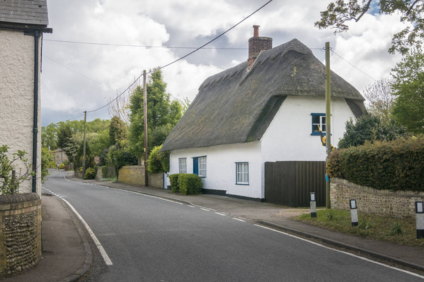 Thatched Cottage in an English Village - Photo, Image