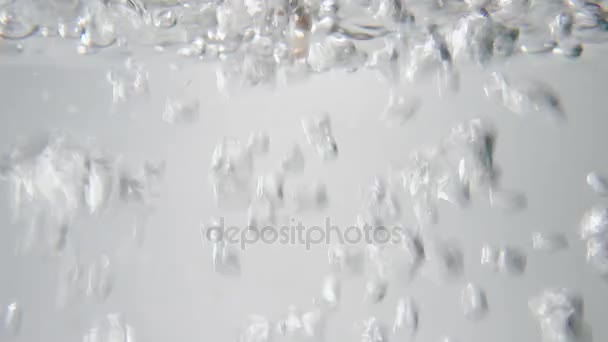 buckwheat fall into boiling water. Macro view - Footage, Video