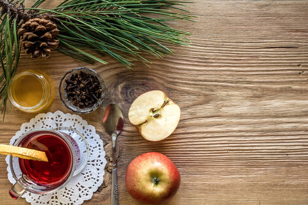 Mulled wine with spices on wooden background - Φωτογραφία, εικόνα