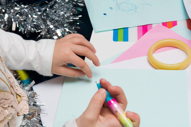 Children using art equipment to draw and make pictures, close up of hands - Foto, imagen