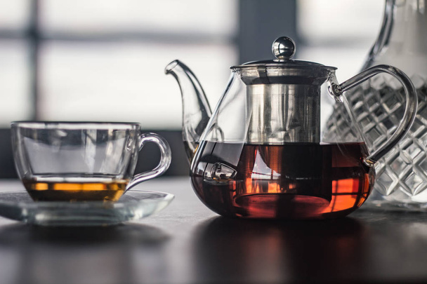 Stylish hookah glass and tea kettle - Foto, afbeelding