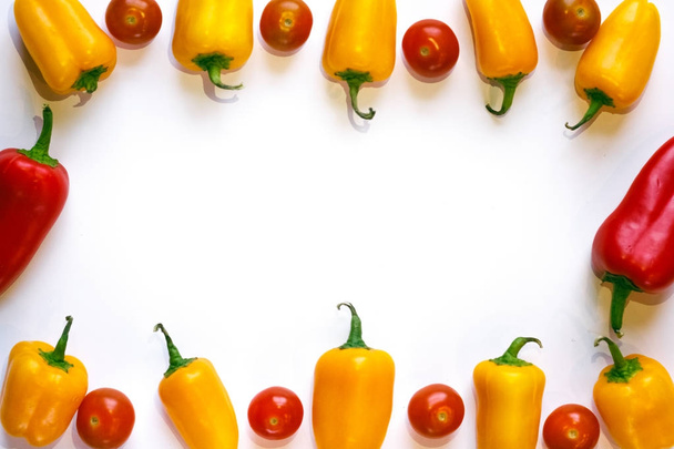 yellow peppers and red cherry tomatoes frame - Фото, зображення
