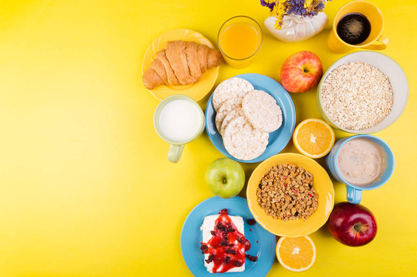 Healthy Breakfast. Various Assortment Set. Orange Juice, Granola, Croissant, Coffee and Fruit. - Photo, Image