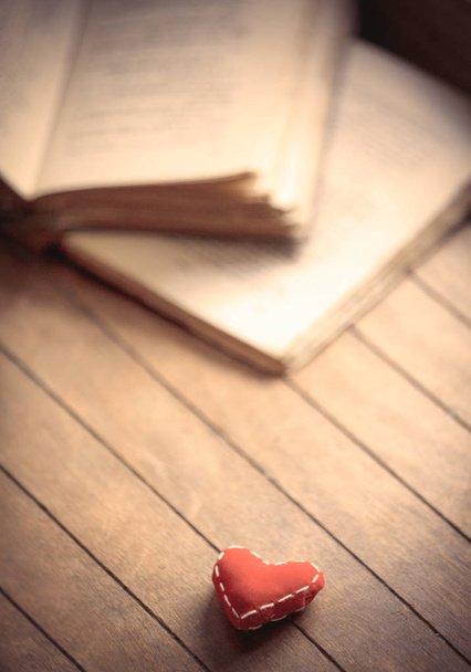 heart shape and old books  - Photo, Image