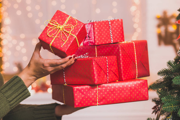 many beautiful present in red wrapping paper - 写真・画像