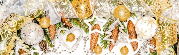 Christmas card with christmas ornaments, with Christmas balls, stars, gold and silver colors - 写真・画像