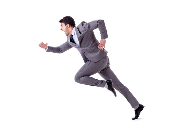 Jovem empresário correndo para a frente isolado em branco
 - Foto, Imagem