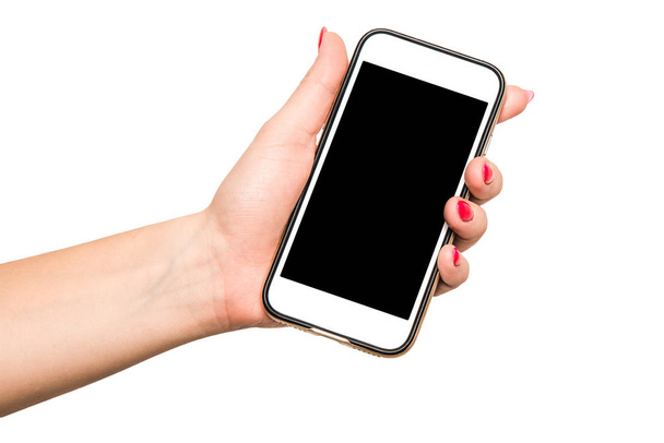 Žena drží v ruce bílý telefon s prázdnou obrazovkou. Je možné dokončit obsah pro mobilní telefony. E-shop. Online nakupování, obsah ve vašem smartphonu. - Fotografie, Obrázek