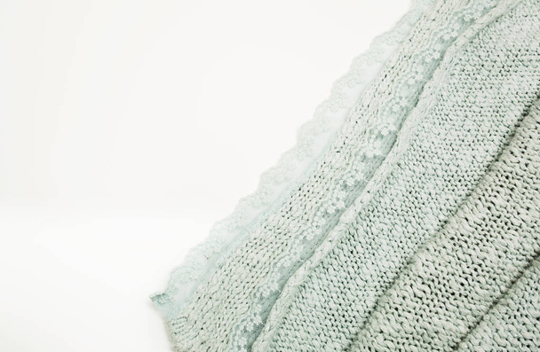 Фрагмент вязаного бирюзового свитера
   - Фото, изображение