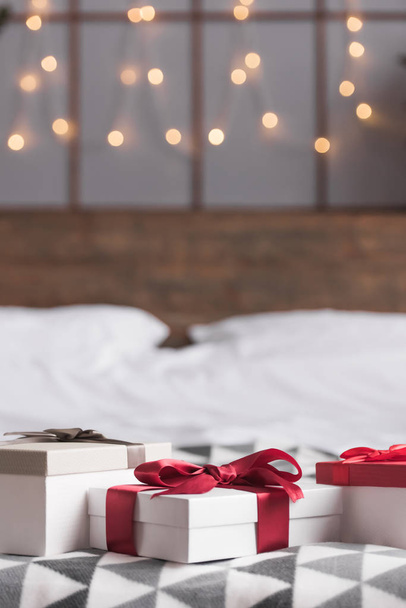 Christmas presents on bed - Photo, Image