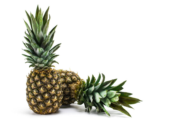 Two ripe fresh pineapples, isolated on white - 写真・画像