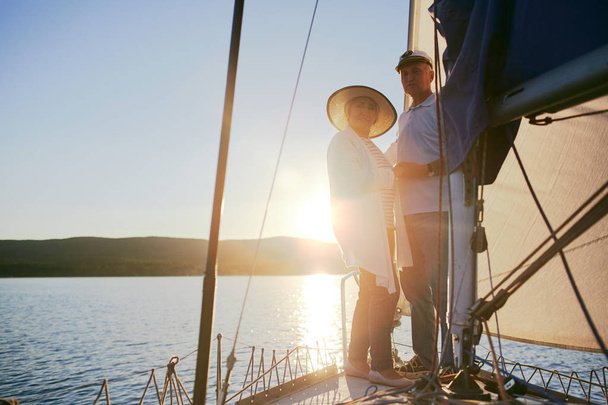 Retired couple traveling by yacht - Photo, Image