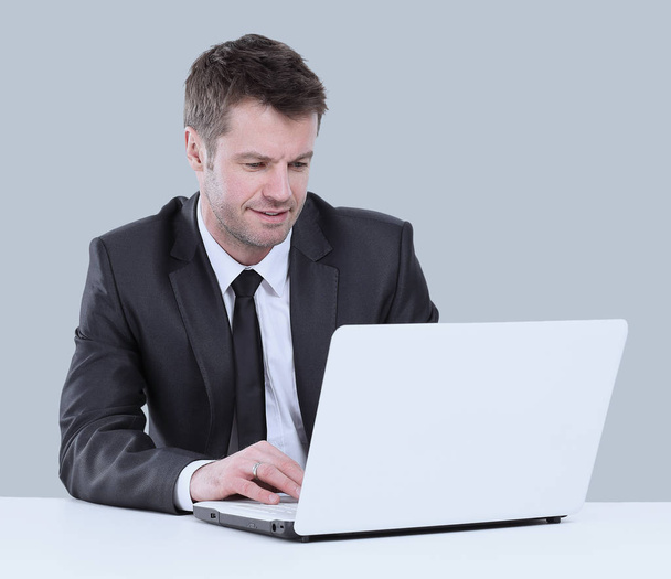 Handsome businessman with laptop isolated on white background - Φωτογραφία, εικόνα