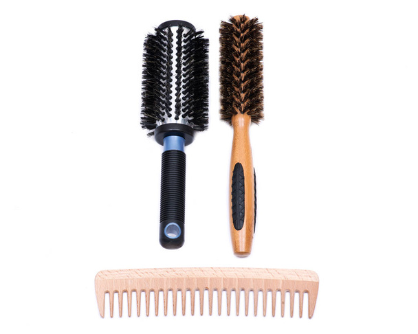 Aluminum barrel round, natural bamboo hairbrushes with wild boar bristles and wooden comb isolated on white background - Photo, Image