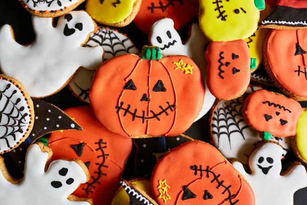 Background of halloween cookies in form of traditional symbols - Photo, Image