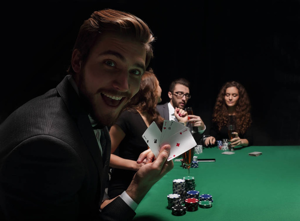 Lucky man with the winning combination of cards - Фото, изображение