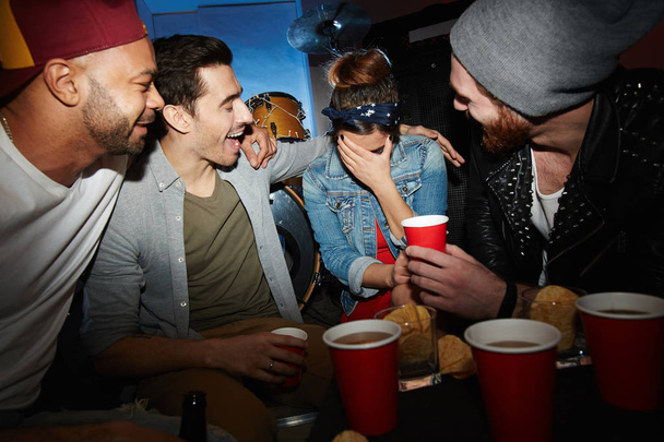 Friendly guys with beer comforting girl at party - Photo, Image