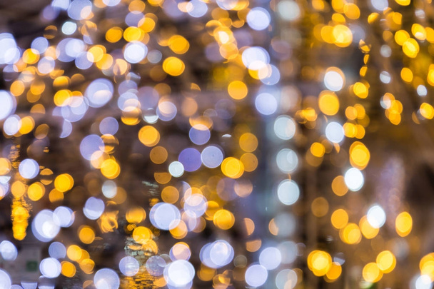Abstract gold and purple bokeh background. Christmas bokeh light - Foto, Bild