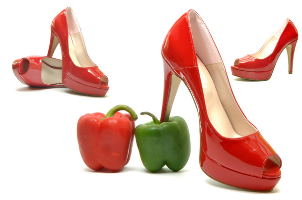 Sexy female shoes between a red and a green pepper 03 - Photo, Image