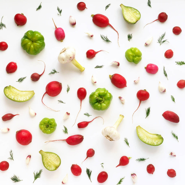 Food composition with radishes, peppers, garlic, cherry tomatoes, pears and dill isolated on white background - Photo, Image