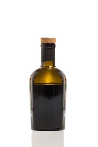 A Half Full Green Bottle Isolated on a White Background. - Fotó, kép