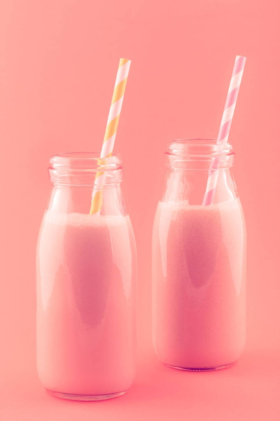 Smoothie in Small Milk Bottles with Striped Drinking Straws. Retro Effect - Φωτογραφία, εικόνα