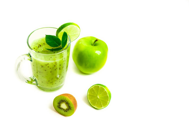 Green healthy cocktail of kiwi, green apple, lime and mint isolated on white background view of a crook - Foto, Bild