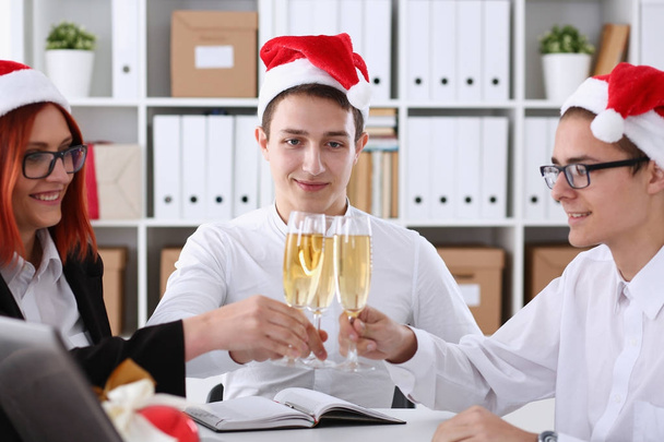 A group of businesspeople celebrating Christmas - Photo, Image