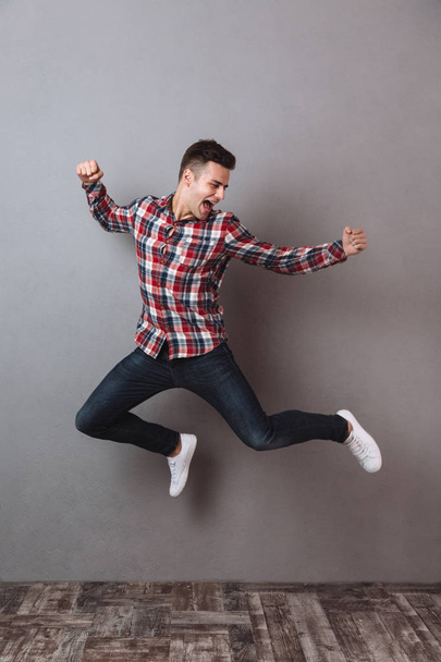 Full length image of Happy man in shirt and jeans - Foto, Imagem